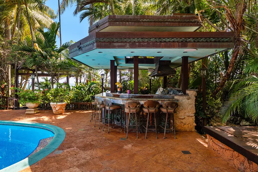 The custom wet bar in the backyard