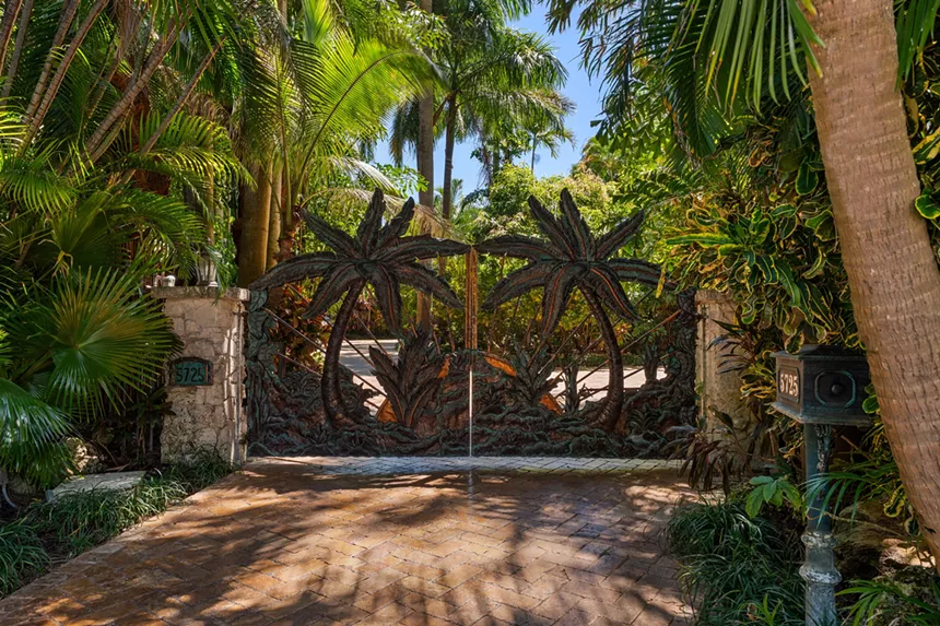 Front gates with palm tree design