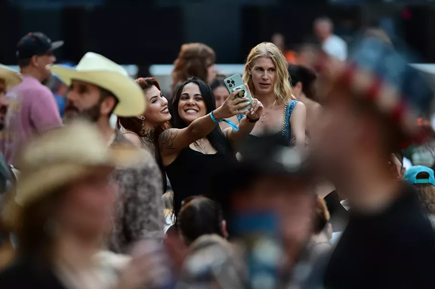 Fans await the start of Post Malone's Big Ass Stadium Tour stop at Hard Rock Stadium in Miami Gardens, Florida, on June 8, 2025