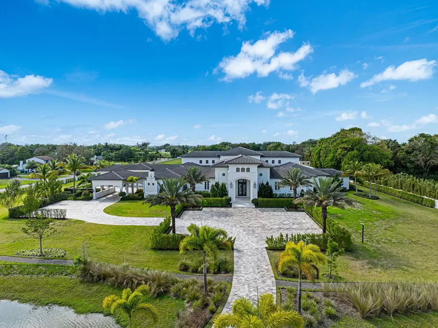 An aerial view of the front side of the mansion.