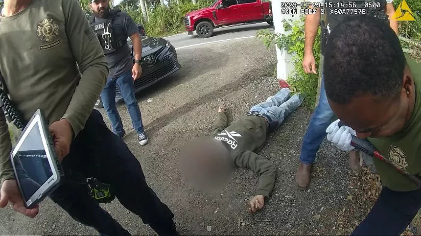 Osvaldo Cueli's face blurred and lies on the ground