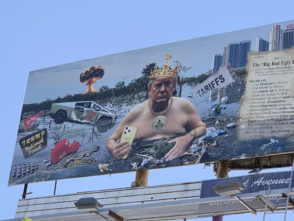 Left side of the "Swamp King" billboard, which depicts Trump as a baby sitting in the swamp and wearing a gold crown
