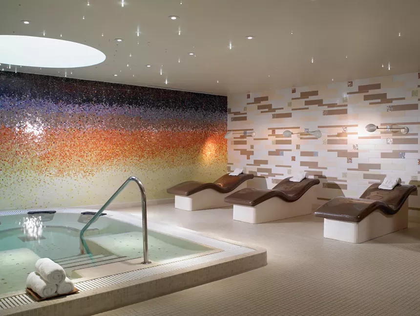 indoor pool and lounge chairs at the Carillon spa