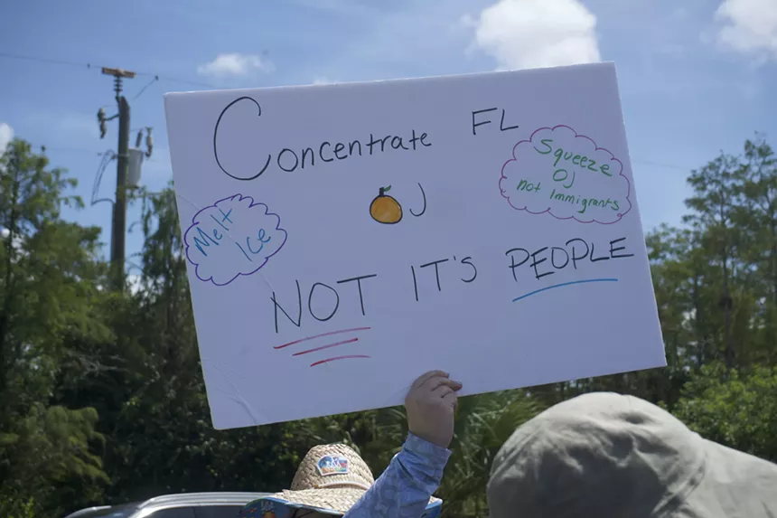 Protesters gather outside Alligator Alcatraz.