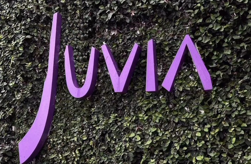 neon purple signage against a backdrop