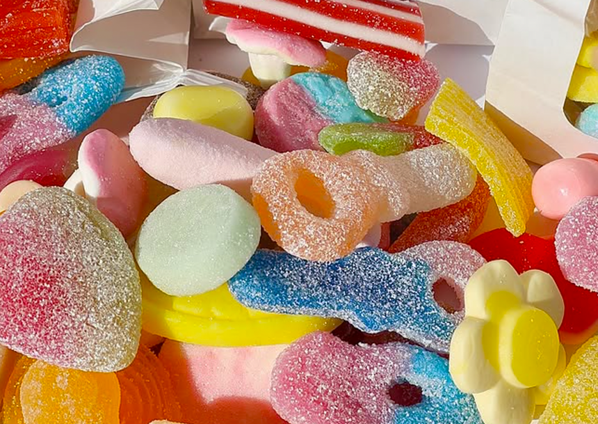 a helping of coloful candies with sugar crystals all over each piece