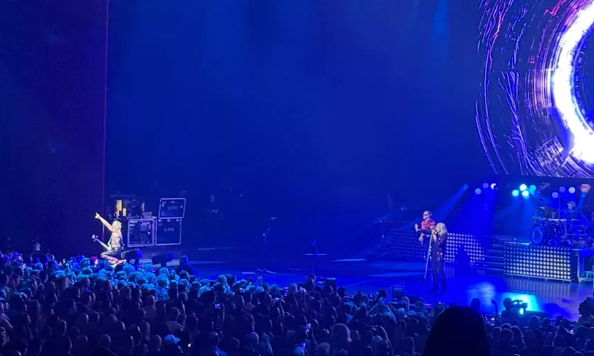 Photo of Def Leppard performing a sold-out show in Hollywood, Florida.
