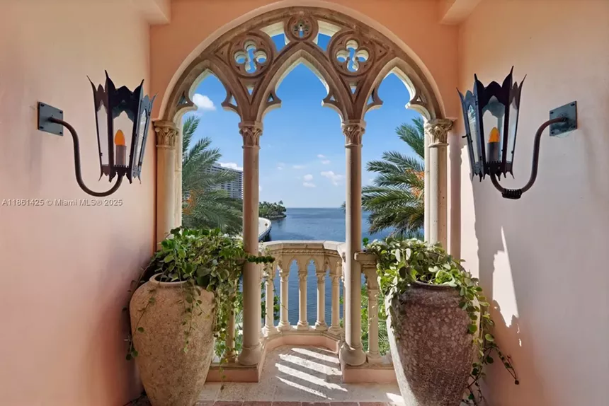 Depicted is a threshold leading to a view of Biscayne Bay.