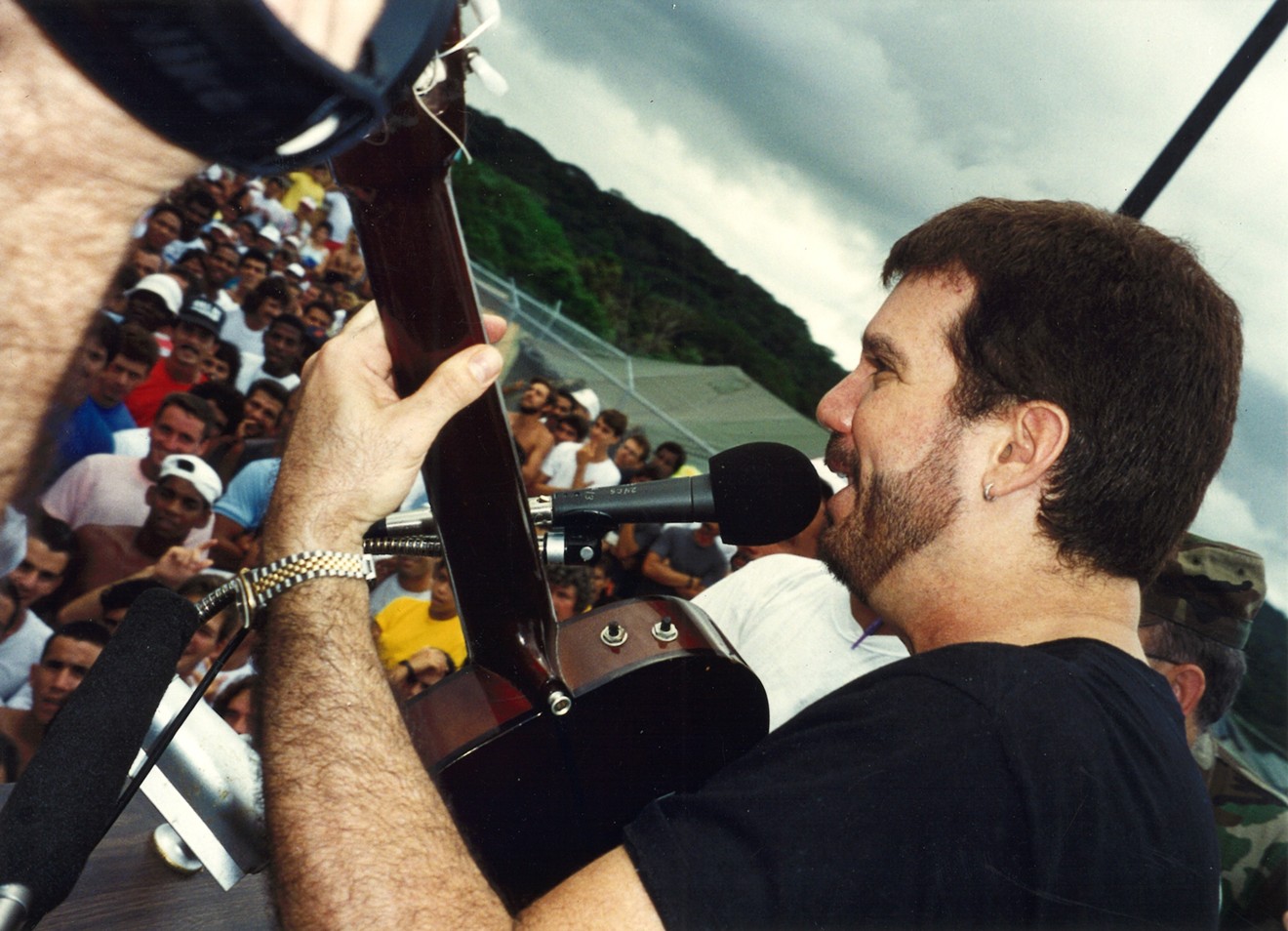 Willy Chirino performs at an outdoor concert in Panama for Cuban detainees in 1994. Chirino's five decades in music are at the center of an exhibition at HistoryMiami Museum.