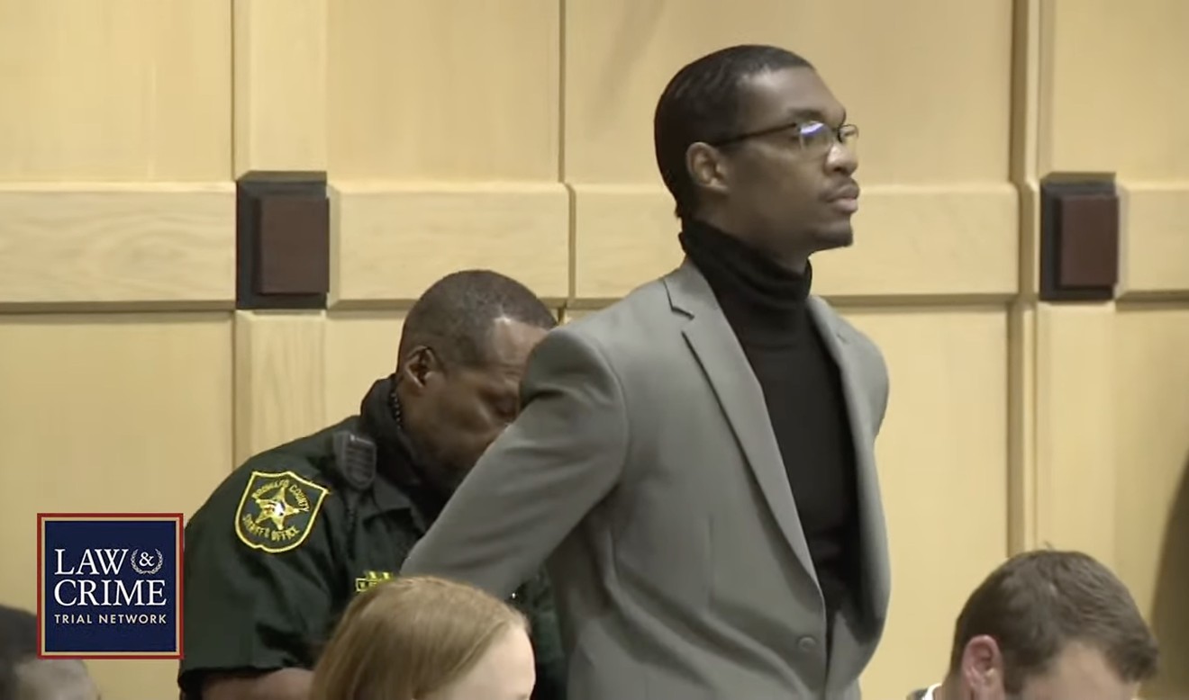 Michael Boatwright, who fired the three shots that killed XXXTentacion (real name Jaseh Onfory), stands to be handcuffed as Judge Michael Usan reads the jury's verdicts on March 20, 2023.
