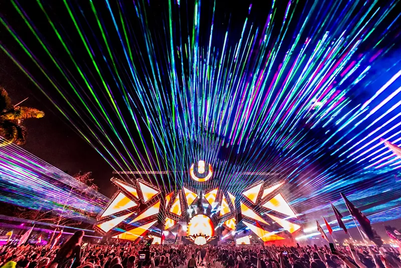 Image: Laser lights shoot through the night sky at Ultra Music Festival