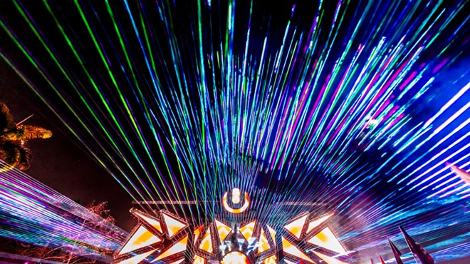 Laser lights shoot through the night sky at Ultra Music Festival