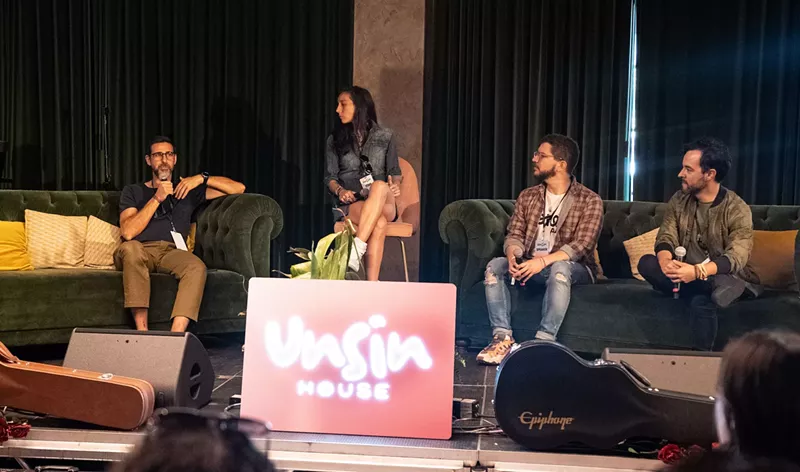 Image: A group of panelists on stage