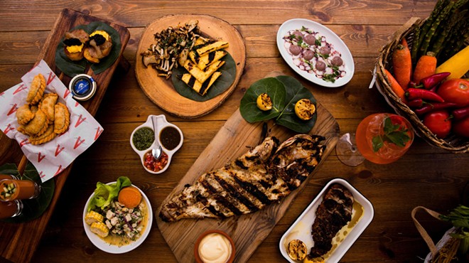 A spread of dishes on a wooden table