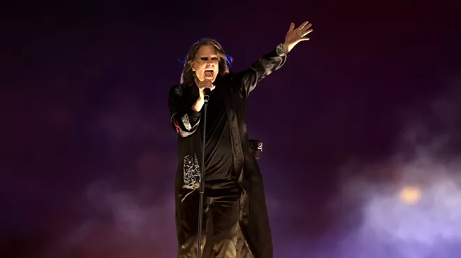 Picture of a heavy metal singer performing on stage