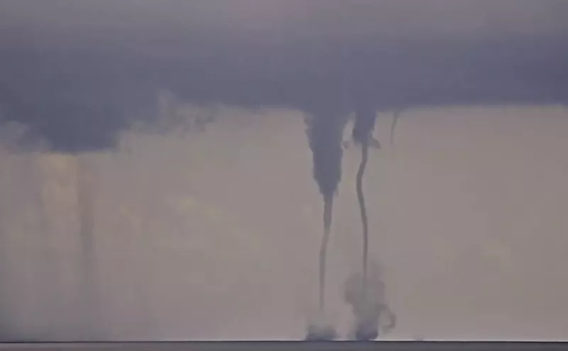 Image: Video: Twin Waterspouts Swirl Off the Palm Beach Coast