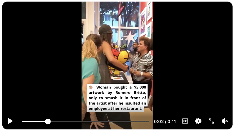 Image: Screenshot of a video showing a standoff between a woman and artist Romero Britto. Text overlayed on the video reads, "🎨 Woman bought a $5,000 artwork by Romero Britto, only to smash it in front of the artist after he insulted an employee at her restaurant."