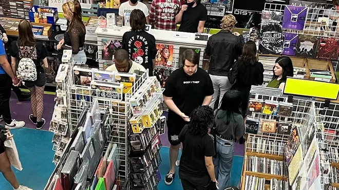 Overhead picture of customers inside a record store