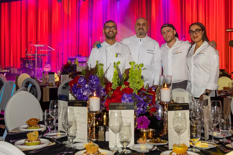 Image: culinary team poses for a photo