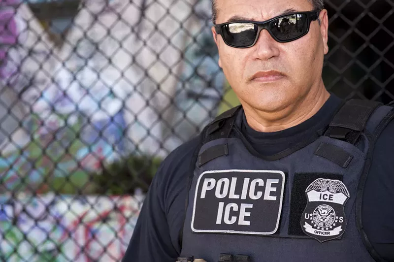 Image: A U.S. Customs and Immigration (ICE) agent in Miami.