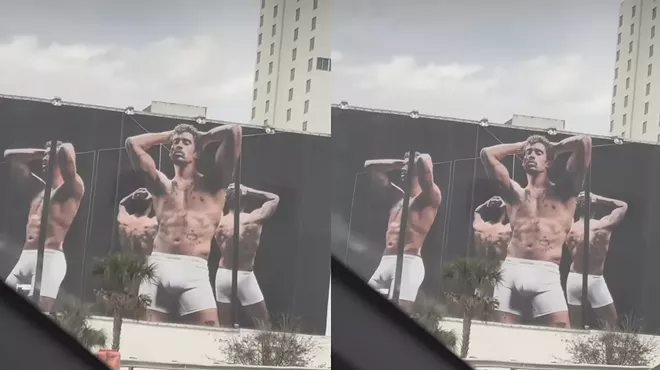 A billboard in Miami showing Bad Bunny posing in Calvin Klein underwear.