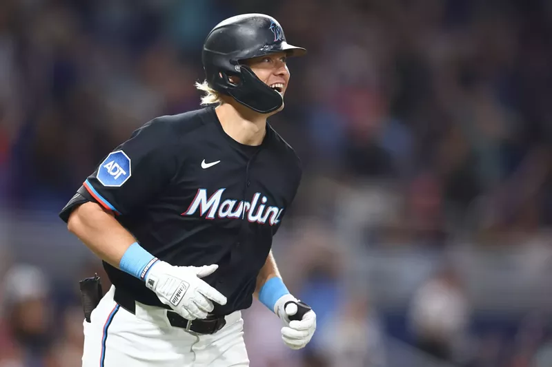 Image: Miami Marlins left fielder Kyle Stowers #28 smiles as he rounds the bases after hitting a walk-off home run at LoanDepot Park in Miami, Florida
