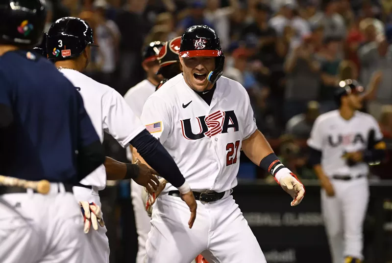 Image: Mike Trout celebrates with teammates after hitting a three-run homer against Canada in the World Baseball Classic on March 13, 2023.