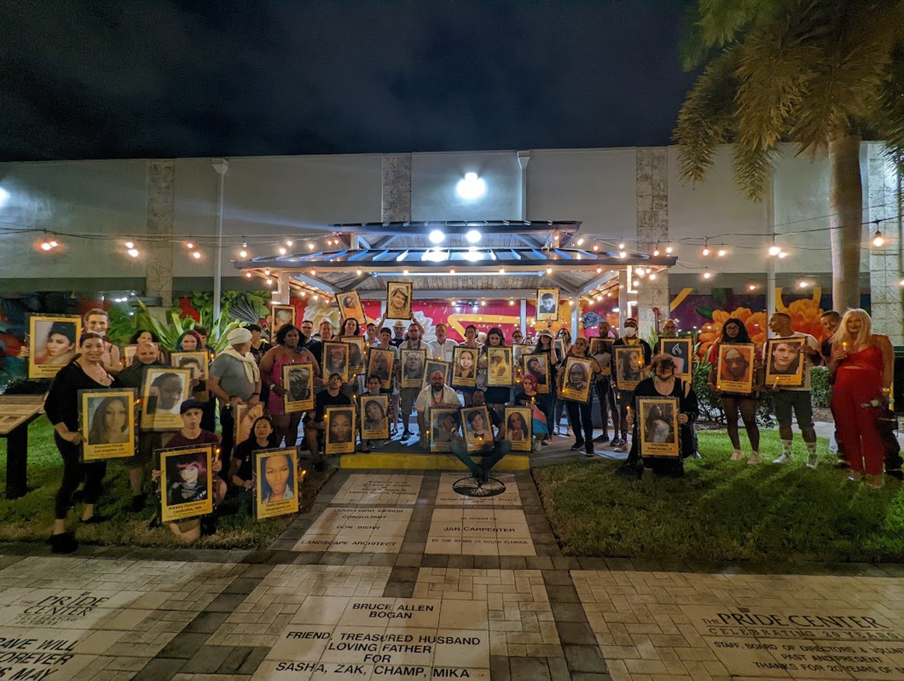 Organizers and LGBTQ advocates gather outside the Pride Center in Wilton Manors on November 20 to honor the memories of trans and nonbinary people who were killed in 2021.