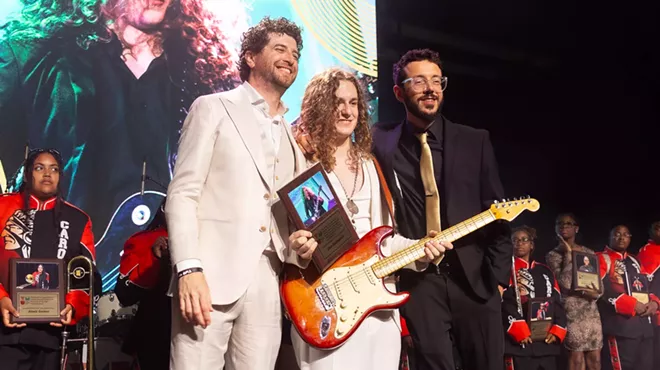 Sammy Gonzalez Zeira on stage with Deo Budnevick and Zach Larmer